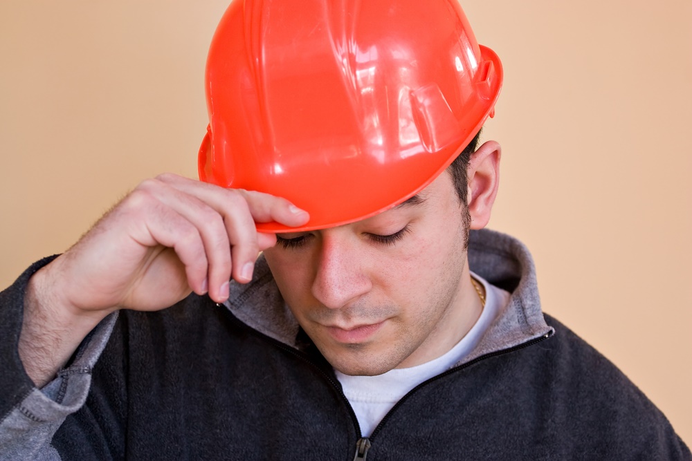 Man in Hard Hat Tipped (full)